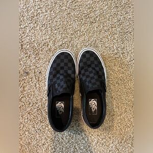 Vans black checkered slip ons
